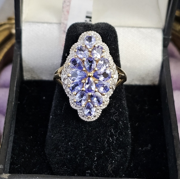 New. 10k tanzanite & diamond ring size 7. Can be resized by a jeweler. Stamped 1 - Picture 2 of 9